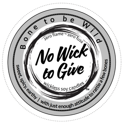 A circular product label for 'No Wick to Give' wickless soy candles with the name Bone to be Wild, shown on a plain white background.