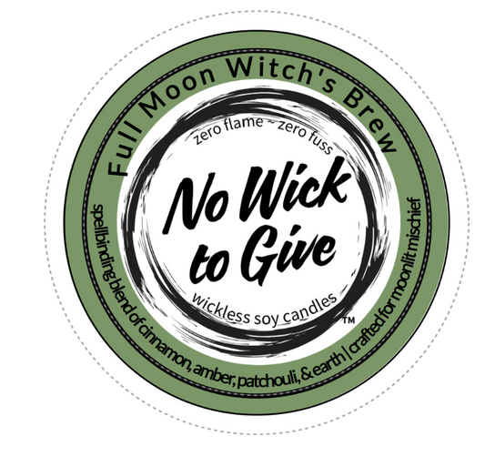 A circular product label for 'Full Moon Witch's Brew' wickless soy candles. The label features a sage green outer ring with black text, a white center, and a black circular brushstroke design in the middle containing the phrase 'No Wick to Give'.