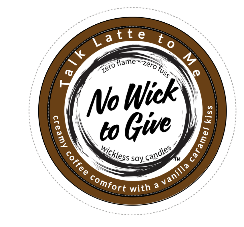 A round wax melt packaging label or sticker for 'No Wick to Give' soy candles, featuring a brown and white design with the scent description 'creamy coffee comfort with a vanilla caramel kiss'.