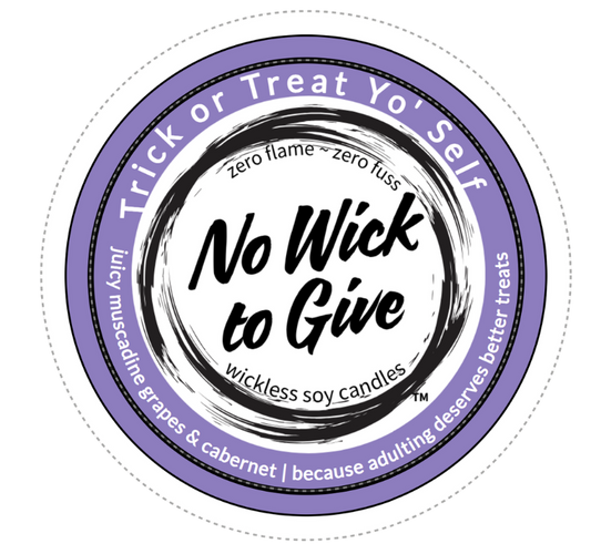 A circular product label for 'No Wick to Give' soy candles, featuring a purple outer ring with white text and a black brushstroke center on a white background.